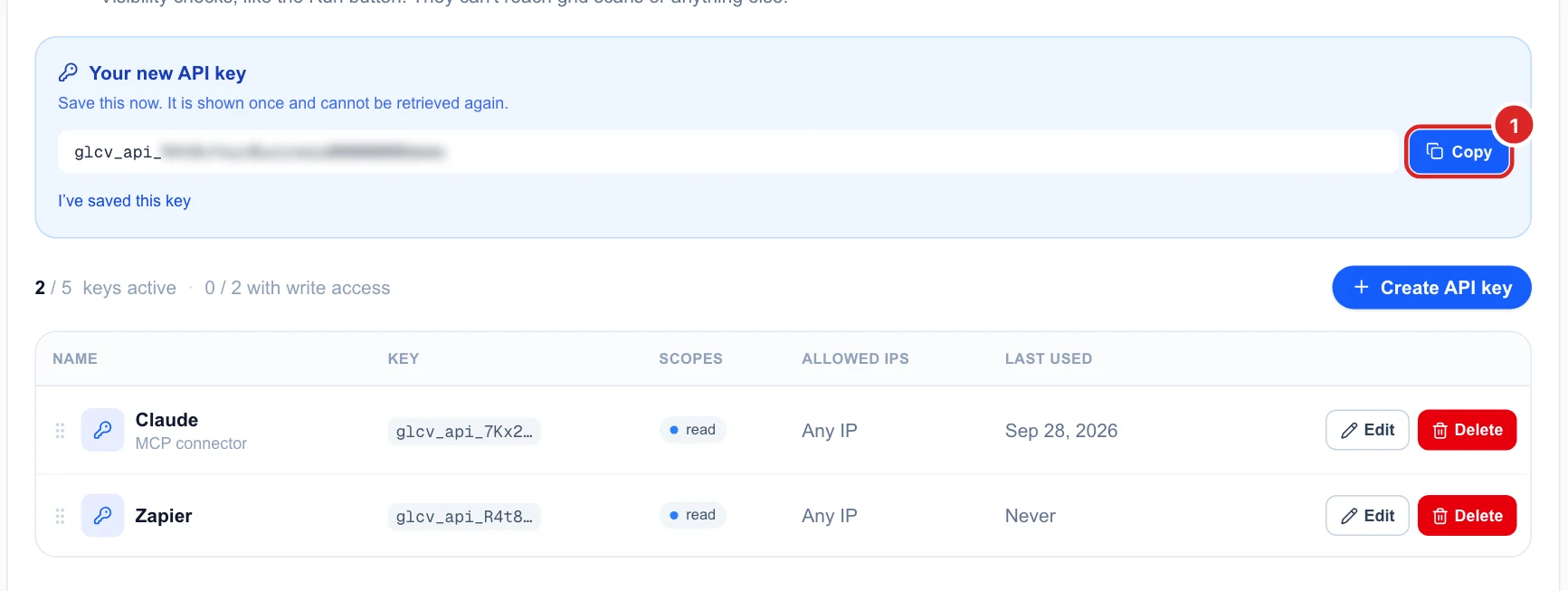 Your new API key, shown once, with a Copy button, and the new Zapier key in the table